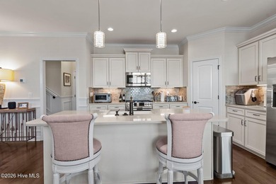 Immaculate 3-bedroom, home with bonus room on a desirable corner on Cape Fear National At Brunswick Forest in North Carolina - for sale on GolfHomes.com, golf home, golf lot