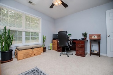 Welcome home! Step inside from the inviting wrap-around front on Creekside Golf and Country Club in Georgia - for sale on GolfHomes.com, golf home, golf lot