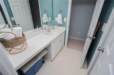 Welcome home! Step inside from the inviting wrap-around front on Creekside Golf and Country Club in Georgia - for sale on GolfHomes.com, golf home, golf lot