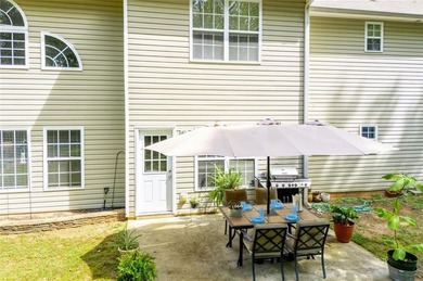 Welcome home! Step inside from the inviting wrap-around front on Creekside Golf and Country Club in Georgia - for sale on GolfHomes.com, golf home, golf lot