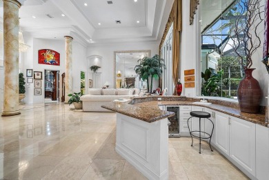 Situated on the North Golf Course in Ballenisles, this spacious on BallenIsles Golf and Country Club in Florida - for sale on GolfHomes.com, golf home, golf lot
