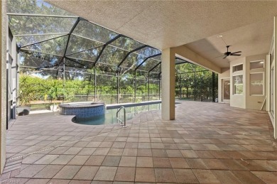Offering over 3,000 square feet of one-level living with soaring on Estero Country Club in Florida - for sale on GolfHomes.com, golf home, golf lot
