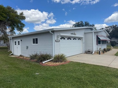 Welcome to this spacious double-wide manufactured home located on Highlands Ridge Golf Course - South in Florida - for sale on GolfHomes.com, golf home, golf lot
