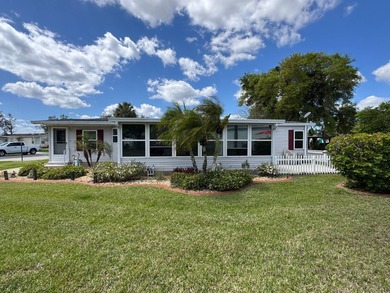 Welcome to this spacious double-wide manufactured home located on Highlands Ridge Golf Course - South in Florida - for sale on GolfHomes.com, golf home, golf lot
