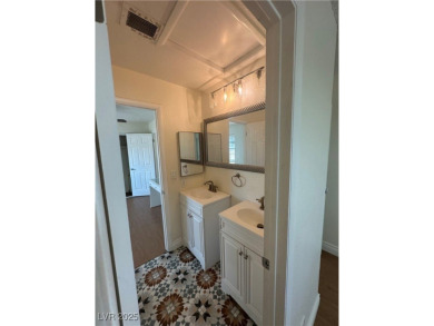 Discover this stunning, renovated home featuring modern quartz on Desert Rose Golf Course in Nevada - for sale on GolfHomes.com, golf home, golf lot