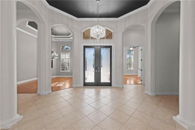 Offering over 3,000 square feet of one-level living with soaring on Estero Country Club in Florida - for sale on GolfHomes.com, golf home, golf lot