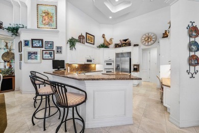 Situated on the North Golf Course in Ballenisles, this spacious on BallenIsles Golf and Country Club in Florida - for sale on GolfHomes.com, golf home, golf lot
