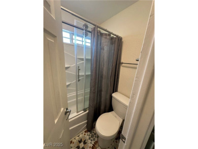 Discover this stunning, renovated home featuring modern quartz on Desert Rose Golf Course in Nevada - for sale on GolfHomes.com, golf home, golf lot