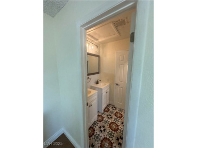 Discover this stunning, renovated home featuring modern quartz on Desert Rose Golf Course in Nevada - for sale on GolfHomes.com, golf home, golf lot