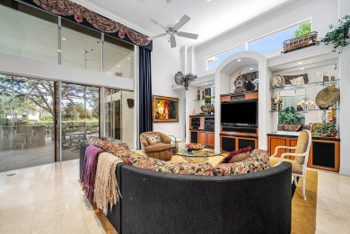 Situated on the North Golf Course in Ballenisles, this spacious on BallenIsles Golf and Country Club in Florida - for sale on GolfHomes.com, golf home, golf lot