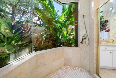 Situated on the North Golf Course in Ballenisles, this spacious on BallenIsles Golf and Country Club in Florida - for sale on GolfHomes.com, golf home, golf lot