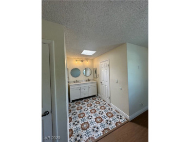 Discover this stunning, renovated home featuring modern quartz on Desert Rose Golf Course in Nevada - for sale on GolfHomes.com, golf home, golf lot