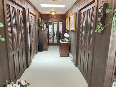 Welcome to 411 E. Mohawk Dr., Malvern. Nestled in the private on Lake Mohawk Golf Club in Ohio - for sale on GolfHomes.com, golf home, golf lot