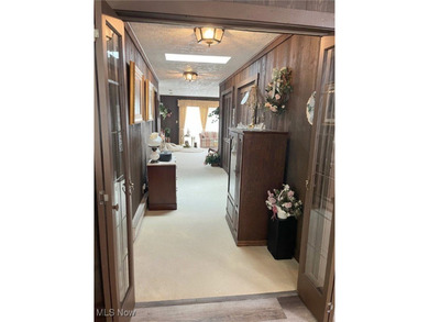 Welcome to 411 E. Mohawk Dr., Malvern. Nestled in the private on Lake Mohawk Golf Club in Ohio - for sale on GolfHomes.com, golf home, golf lot