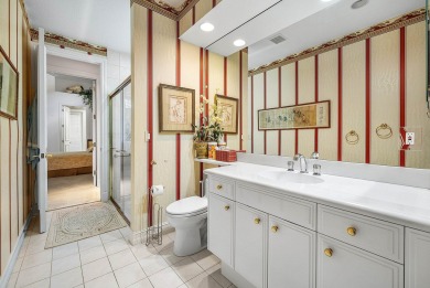 Situated on the North Golf Course in Ballenisles, this spacious on BallenIsles Golf and Country Club in Florida - for sale on GolfHomes.com, golf home, golf lot