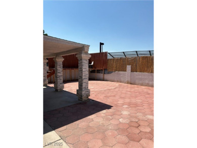 Discover this stunning, renovated home featuring modern quartz on Desert Rose Golf Course in Nevada - for sale on GolfHomes.com, golf home, golf lot
