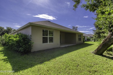 Atypically large, well-designed home, consisting of 2,618 sq. ft on Halifax Plantation Golf Club in Florida - for sale on GolfHomes.com, golf home, golf lot