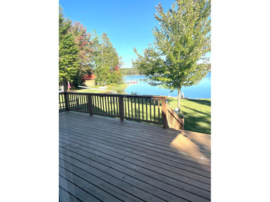 Pride of ownership is evident in this beautifully maintained on Wildwood Lakes in Michigan - for sale on GolfHomes.com, golf home, golf lot