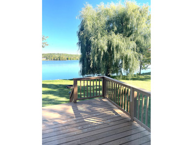 Pride of ownership is evident in this beautifully maintained on Wildwood Lakes in Michigan - for sale on GolfHomes.com, golf home, golf lot