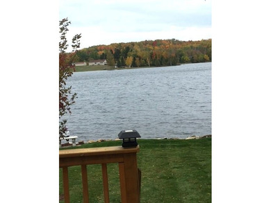 Pride of ownership is evident in this beautifully maintained on Wildwood Lakes in Michigan - for sale on GolfHomes.com, golf home, golf lot