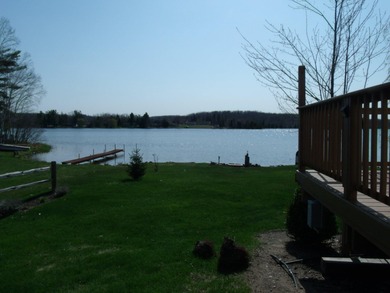 Pride of ownership is evident in this beautifully maintained on Wildwood Lakes in Michigan - for sale on GolfHomes.com, golf home, golf lot