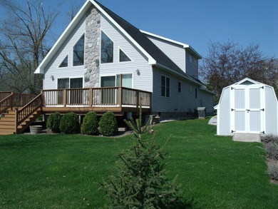 Pride of ownership is evident in this beautifully maintained on Wildwood Lakes in Michigan - for sale on GolfHomes.com, golf home, golf lot