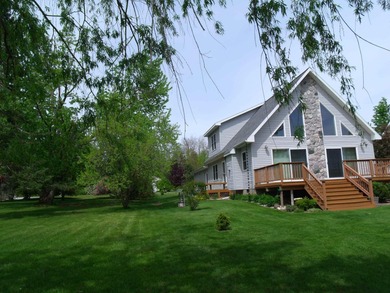 Pride of ownership is evident in this beautifully maintained on Wildwood Lakes in Michigan - for sale on GolfHomes.com, golf home, golf lot