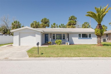 This COMPLETELY Remodeled home is in the waterfront community of on Gulf Harbors Golf Course in Florida - for sale on GolfHomes.com, golf home, golf lot