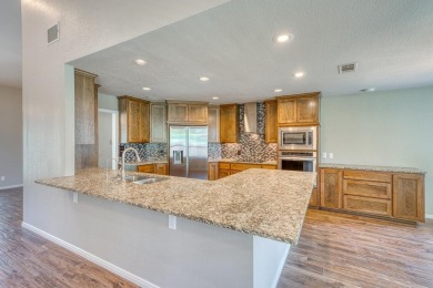 This 3/2/2 beautiful home in Meadowlakes Texas is 2,234 sq. feet on Hidden Falls Golf Club in Texas - for sale on GolfHomes.com, golf home, golf lot