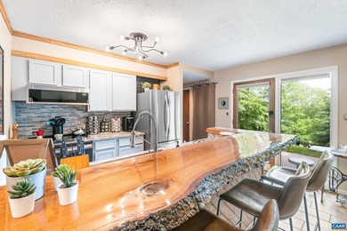 Step into a beautifully transformed contemporary condo where on Devils Knob in Virginia - for sale on GolfHomes.com, golf home, golf lot