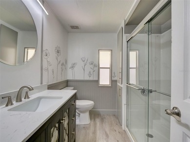 Seeing is believing....... this tastefully remodeled home is one on Zellwood Station Country Club in Florida - for sale on GolfHomes.com, golf home, golf lot