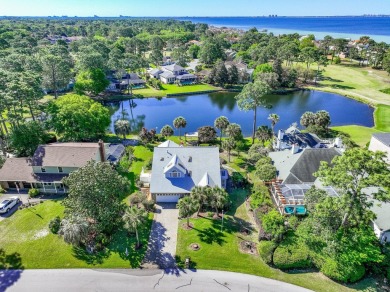 LAKEFRONT LIVING IN GATED SOUTHWIND - ROOM TO UPDATE, VIEWS TO on Golf Club at Bluewater Bay Resort in Florida - for sale on GolfHomes.com, golf home, golf lot
