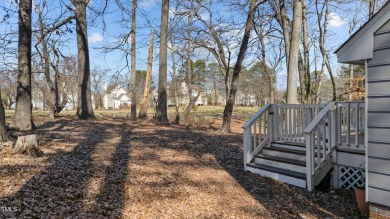 Welcome to this beautifully maintained 3-bedroom, 2-bathroom on Hedingham Golf and Athletic Club in North Carolina - for sale on GolfHomes.com, golf home, golf lot