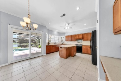 LAKEFRONT LIVING IN GATED SOUTHWIND - ROOM TO UPDATE, VIEWS TO on Golf Club at Bluewater Bay Resort in Florida - for sale on GolfHomes.com, golf home, golf lot