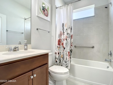 Your Slice of Paradise Is Calling! This spacious 3-bedroom on LPGA International Golf Course in Florida - for sale on GolfHomes.com, golf home, golf lot