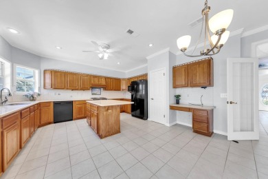 LAKEFRONT LIVING IN GATED SOUTHWIND - ROOM TO UPDATE, VIEWS TO on Golf Club at Bluewater Bay Resort in Florida - for sale on GolfHomes.com, golf home, golf lot