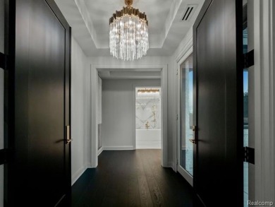 Welcome to this show-stopping estate in the prestigious gated on Meadowbrook Country Club in Michigan - for sale on GolfHomes.com, golf home, golf lot