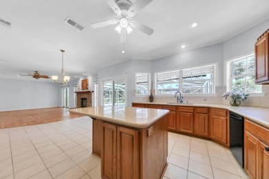 LAKEFRONT LIVING IN GATED SOUTHWIND - ROOM TO UPDATE, VIEWS TO on Golf Club at Bluewater Bay Resort in Florida - for sale on GolfHomes.com, golf home, golf lot