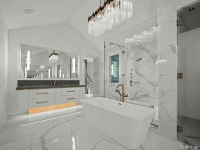 Welcome to this show-stopping estate in the prestigious gated on Meadowbrook Country Club in Michigan - for sale on GolfHomes.com, golf home, golf lot