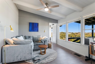 This beautiful hilltop home offers fantastic views of nearby on Apple Rock Golf Course - Horseshoe Bay in Texas - for sale on GolfHomes.com, golf home, golf lot