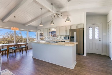 This beautiful hilltop home offers fantastic views of nearby on Apple Rock Golf Course - Horseshoe Bay in Texas - for sale on GolfHomes.com, golf home, golf lot