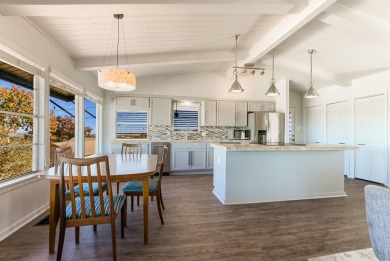 This beautiful hilltop home offers fantastic views of nearby on Apple Rock Golf Course - Horseshoe Bay in Texas - for sale on GolfHomes.com, golf home, golf lot