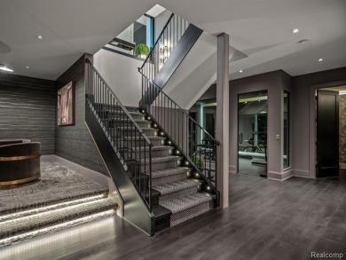 Welcome to this show-stopping estate in the prestigious gated on Meadowbrook Country Club in Michigan - for sale on GolfHomes.com, golf home, golf lot