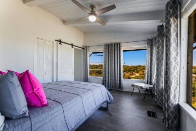 This beautiful hilltop home offers fantastic views of nearby on Apple Rock Golf Course - Horseshoe Bay in Texas - for sale on GolfHomes.com, golf home, golf lot