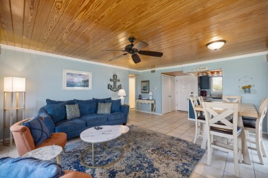 Discover this elegantly appointed second-floor, 2-bedroom on Sandpiper Cove Golf Course in Florida - for sale on GolfHomes.com, golf home, golf lot