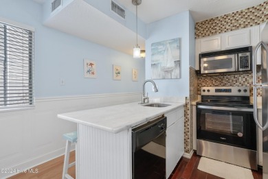 Welcome to this second-floor condominium, ideally located in the on Carolina Shores Golf Course in North Carolina - for sale on GolfHomes.com, golf home, golf lot