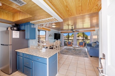 Discover this elegantly appointed second-floor, 2-bedroom on Sandpiper Cove Golf Course in Florida - for sale on GolfHomes.com, golf home, golf lot