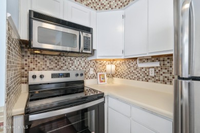 Welcome to this second-floor condominium, ideally located in the on Carolina Shores Golf Course in North Carolina - for sale on GolfHomes.com, golf home, golf lot