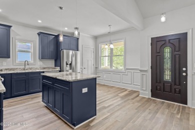 Coastal Luxury Meets Livability at 1552 Windsong Drive in Ocean on Brick Landing Plantation Yacht and Golf Club in North Carolina - for sale on GolfHomes.com, golf home, golf lot