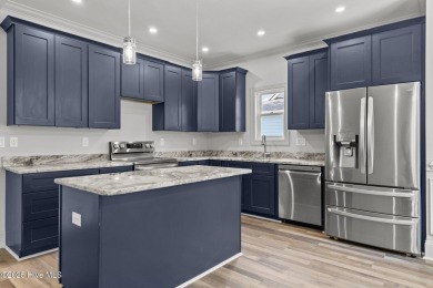 Coastal Luxury Meets Livability at 1552 Windsong Drive in Ocean on Brick Landing Plantation Yacht and Golf Club in North Carolina - for sale on GolfHomes.com, golf home, golf lot
